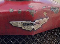 The winged Aston Martin logo was introduced in 1932