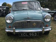 Morris badge on the front bonnet, above vintage RAC and AA badges