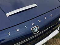 Triumph bonnet badge and brand designation